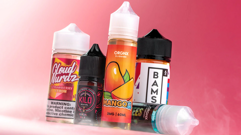A selection of vape juice bottles featuring popular brands and flavors.