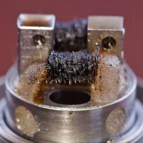 should i stop hitting my vape if it tastes burnt